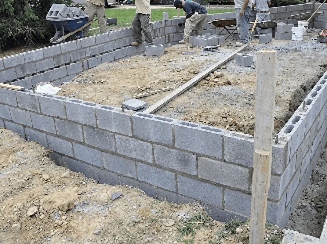 Professionals building a foundation with blocks in Pembroke Pines, FL