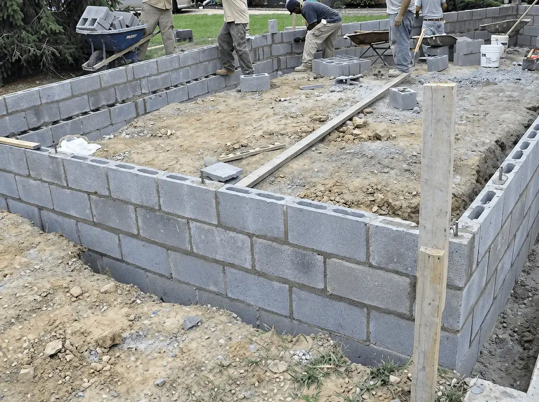 Professionals building a foundation with blocks in Pembroke Pines, FL