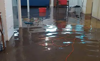 Basement with boiler, cabinets and washing machine completely flooded in Pembroke Pines, FL